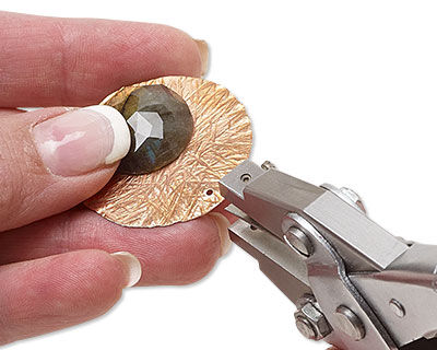 Hole punch on metal round
